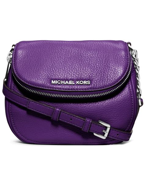 purple michael kors crossbody.